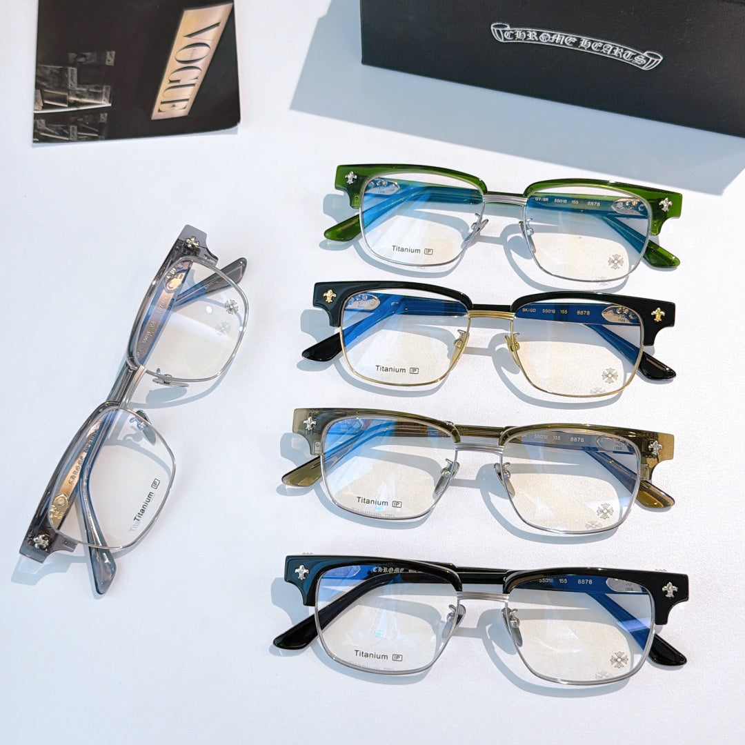 Assorted eyeglasses with clear lenses: green, black, and blue frames
