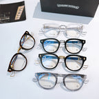 Set of multiple eyeglass frames in clear, black, and blue-tinted lenses on display.