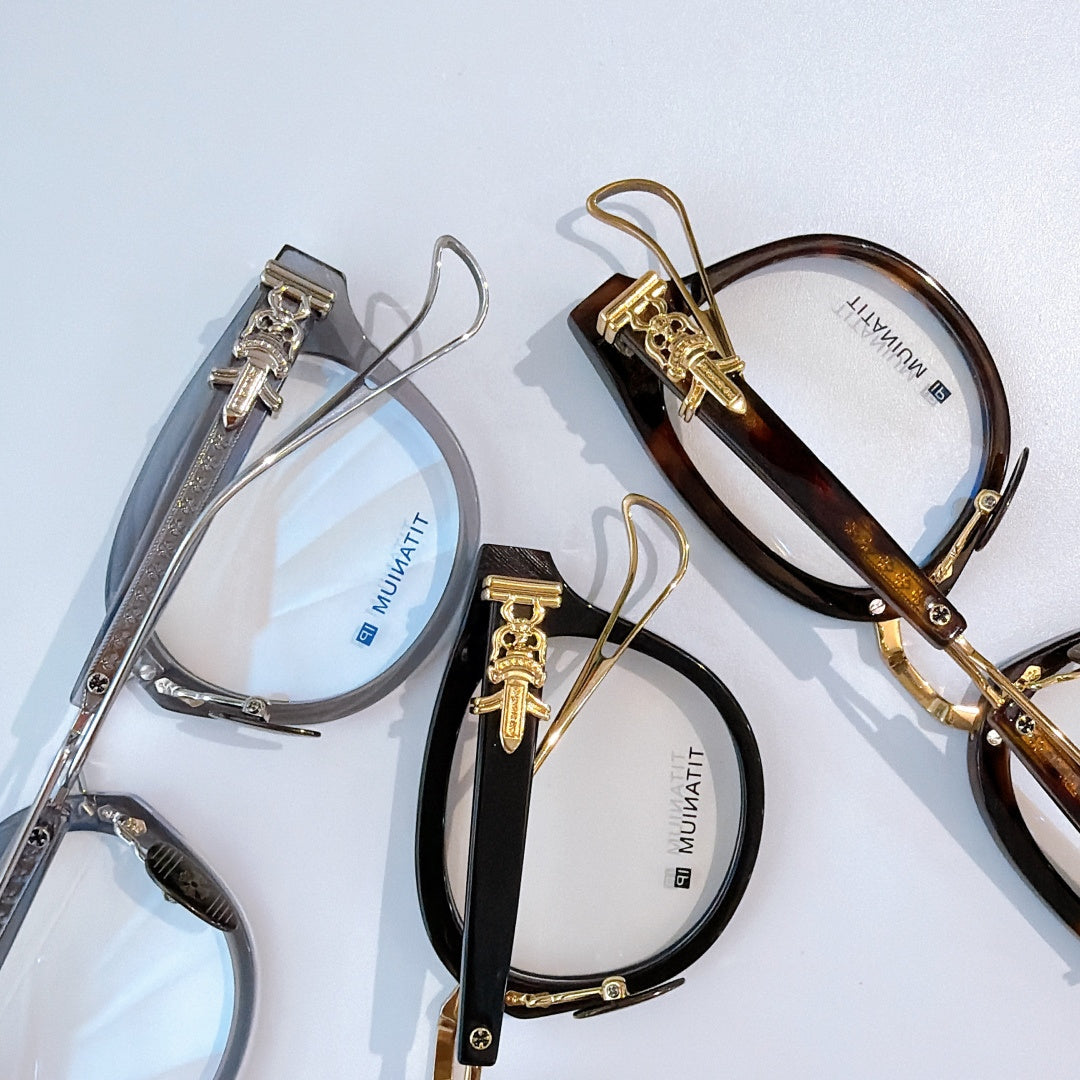 Two pairs of glasses: silver with transparent arms and gold-tortoiseshell frame with clear lenses.