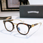 Brown tortoiseshell and gold round-frame glasses with clear lenses; logo at temple.
