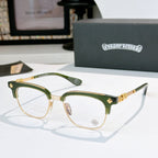 Chrome glasses with clear lenses, green acetate frame with gold-tone arms and star accents