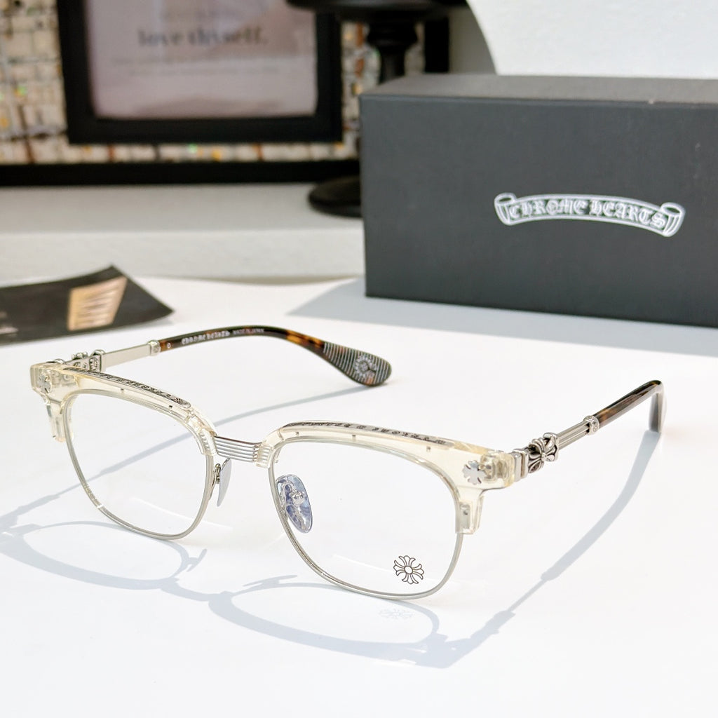Chrome glasses with clear lenses, gold-tone metal frame and tortoise temple tips