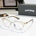 Chrome glasses with clear lenses, gold-tone metal frame and tortoise temple tips