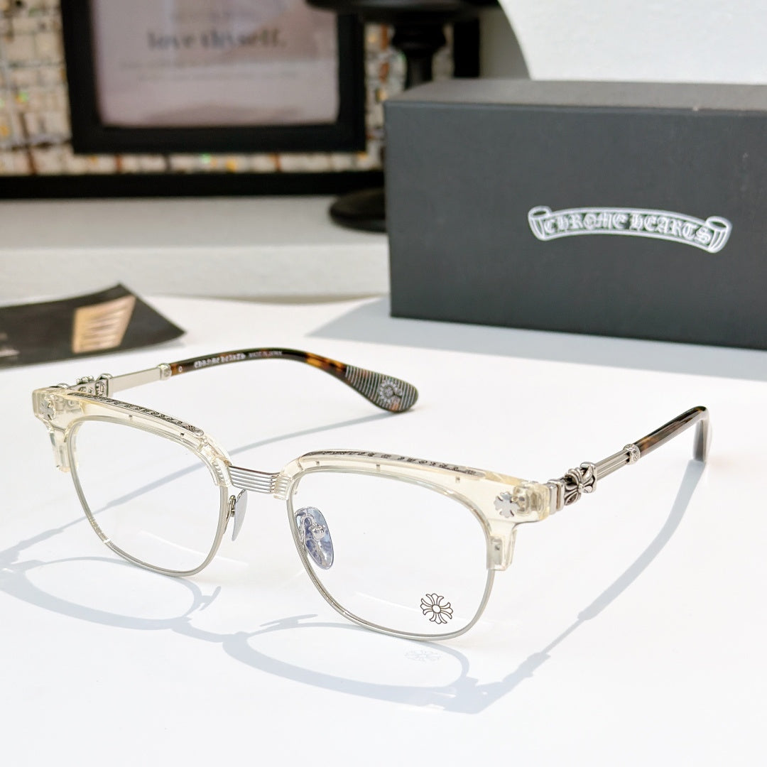 Chrome glasses with clear lenses, gold-tone metal frame and tortoise temple tips