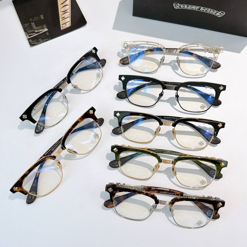 Chrome glasses assortment with clear lenses in black, green, and tortoise frames