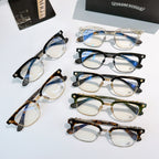 Chrome glasses assortment with clear lenses in black, green, and tortoise frames