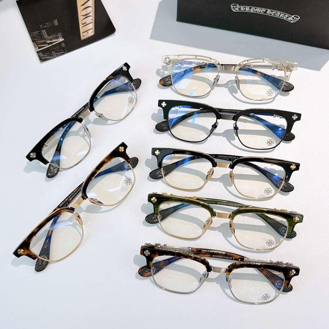 Chrome glasses assortment with clear lenses in black, green, and tortoise frames