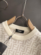 Cream sweater neckline with ribbed collar and Fendi FF pattern, hanging label