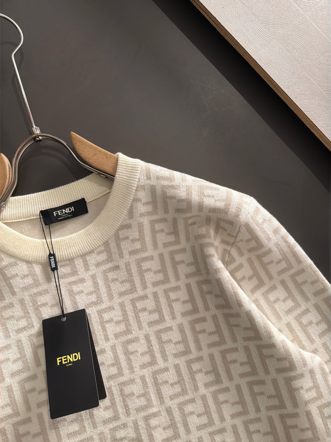 Cream Fendi FF monogram long-sleeve sweater close-up with crew neck