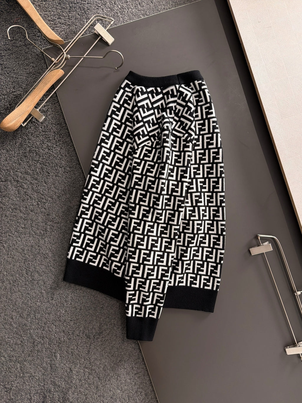 Fendi long-sleeve knit top, black with white FF logo pattern and ribbed cuffs