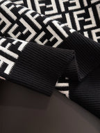 Fendi long-sleeve knit top cuff detail, black ribbed trim with white FF logo