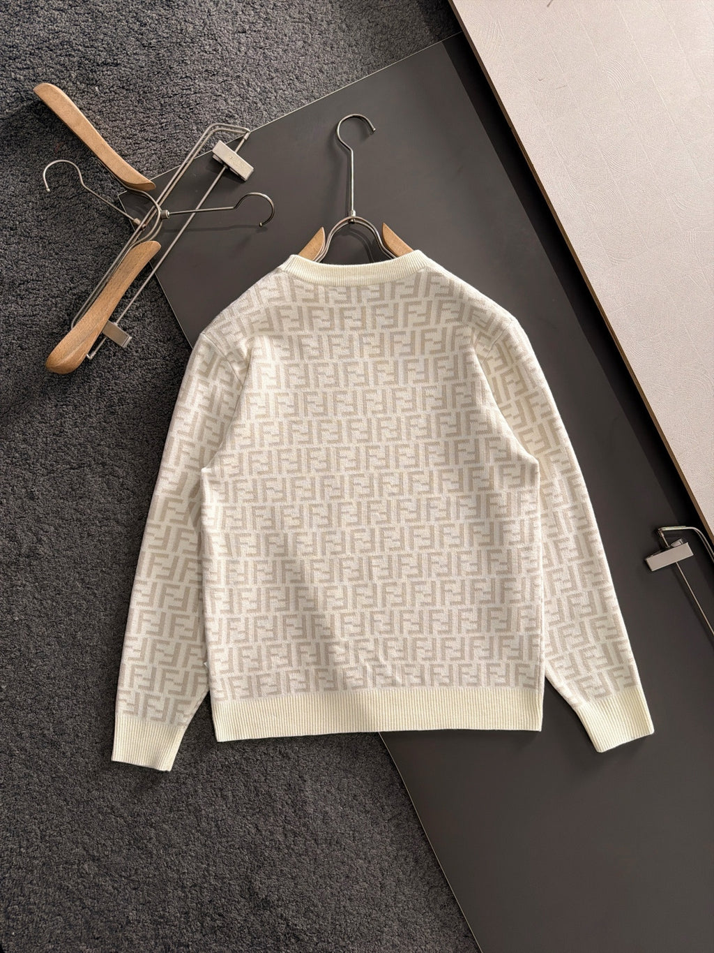 Cream long-sleeve Fendi FF monogram sweater viewed from the back