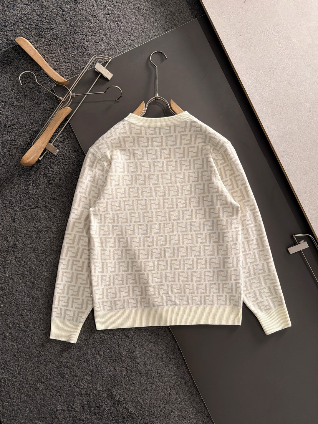 Cream long-sleeve Fendi FF monogram sweater viewed from the back