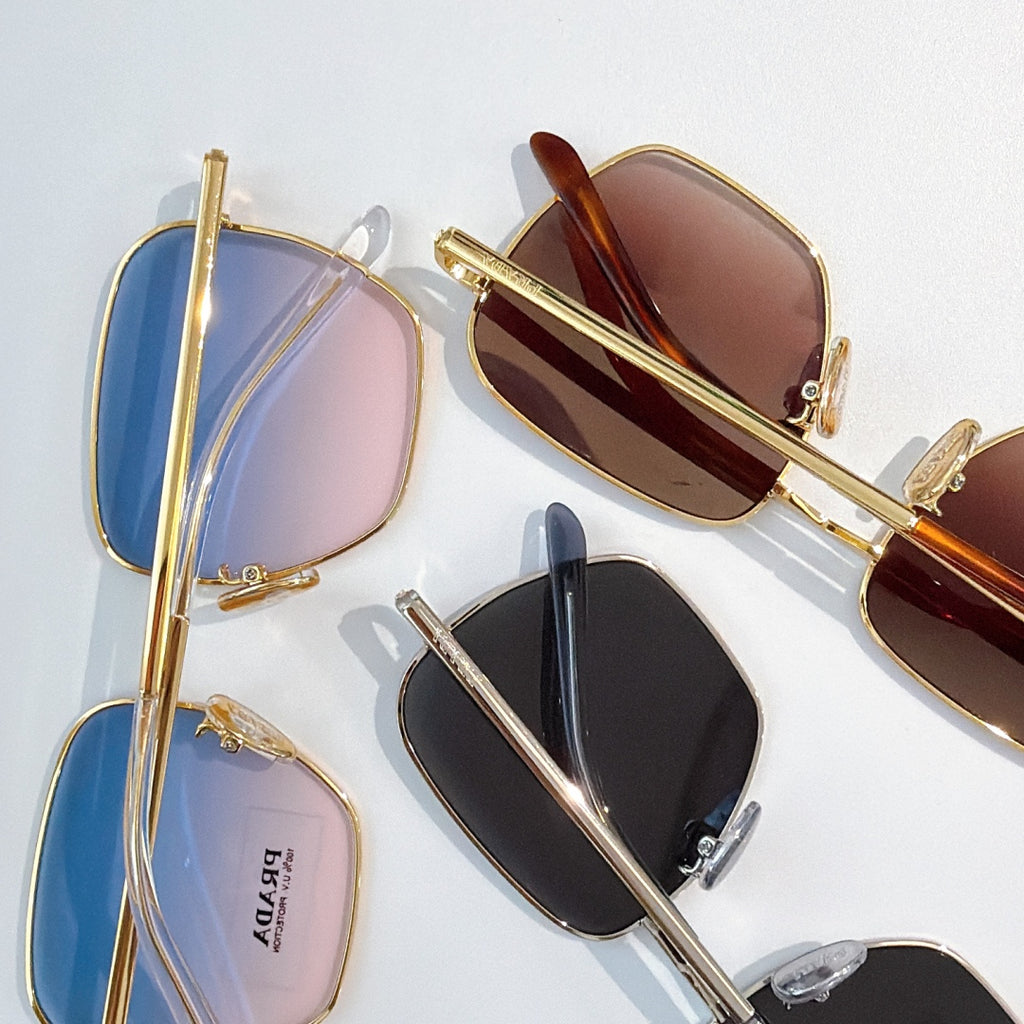 Assorted sunglasses with blue, burgundy, and black tinted square lenses