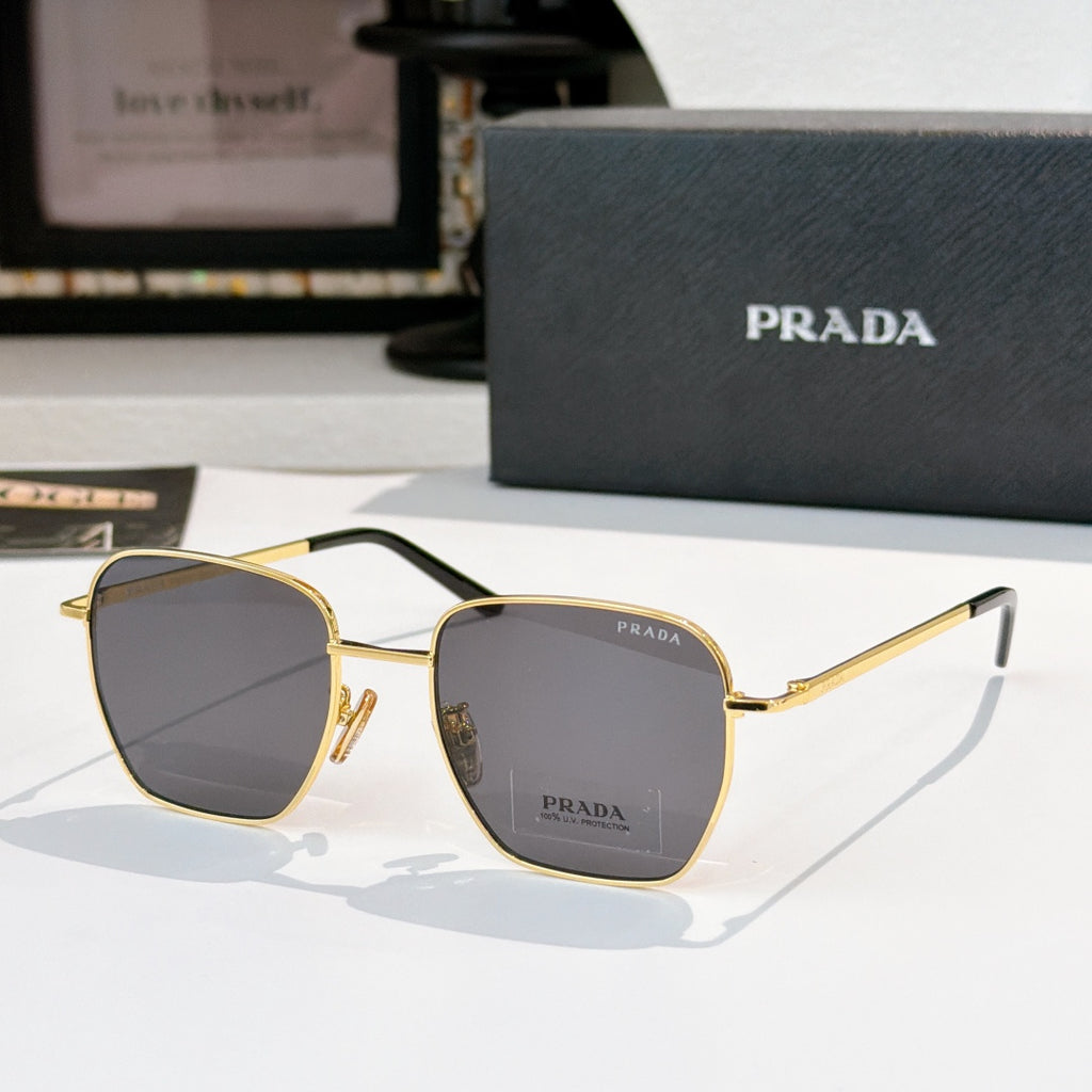 Sunglasses with square gray tinted lenses and gold frame