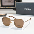 Sunglasses with square brown tinted lenses and tortoiseshell frame