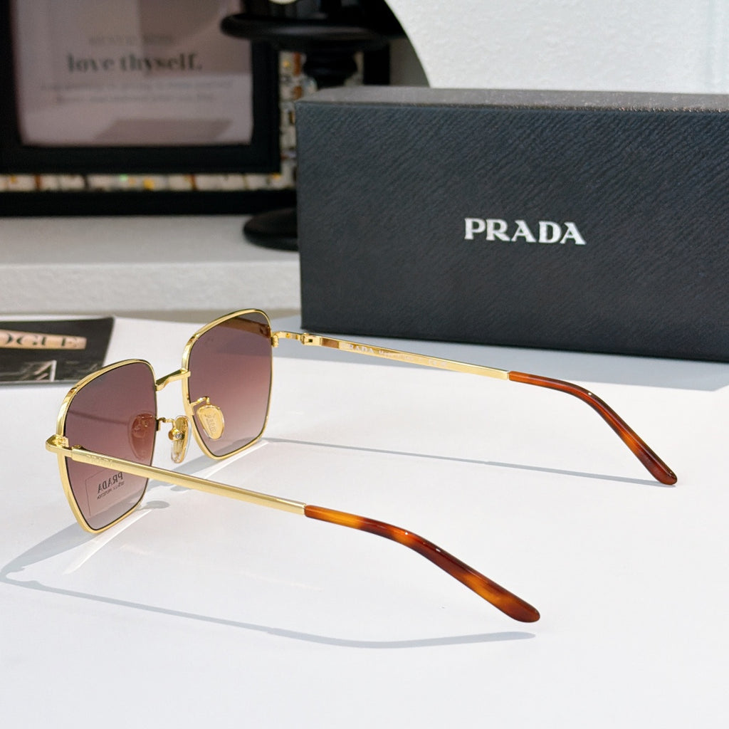 Sunglasses with small square purple tinted lenses and gold frame with brown temples