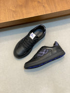 Burberry sneakers, dark leather with blue plaid tongue, lace-up, blue-trim sole
