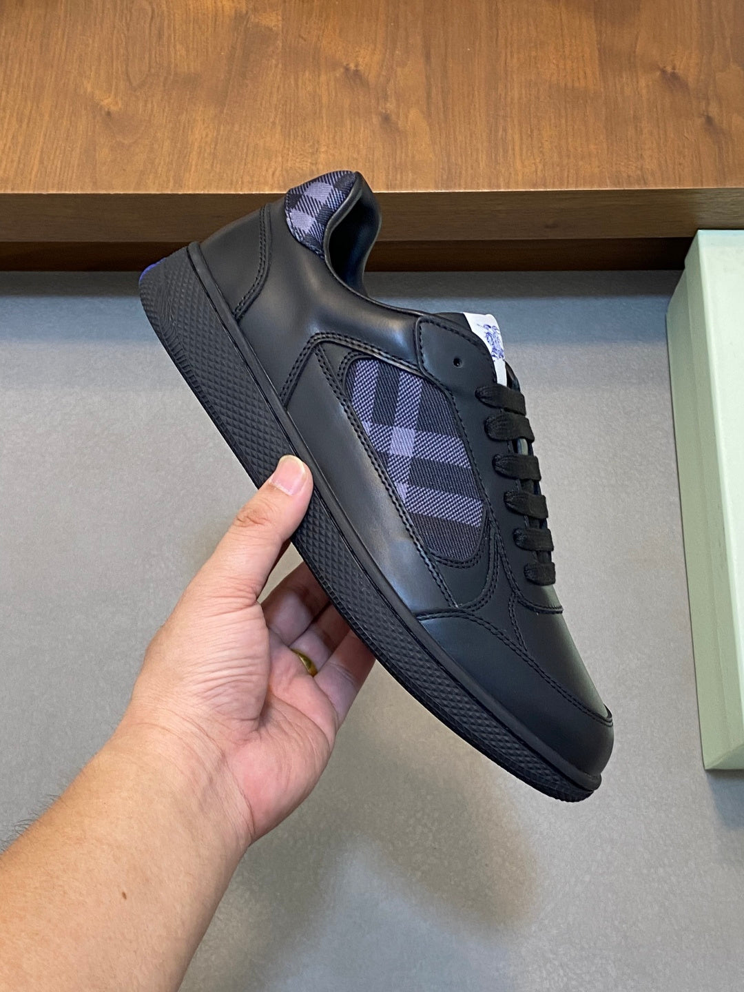 Burberry sneaker upper in dark leather with blue plaid detail, lace-up
