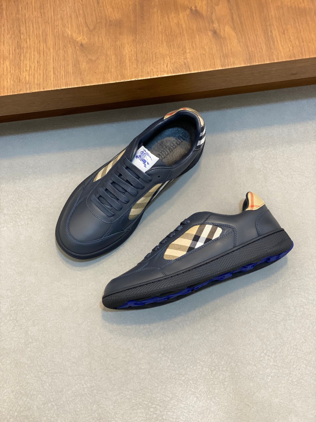 Burberry low-top sneakers, blue leather with check window and rubber sole