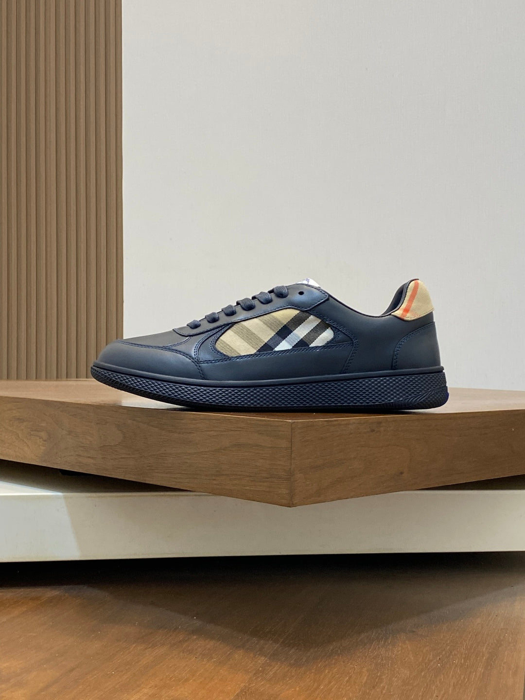 Burberry low-top sneakers side view, blue leather with beige check strap