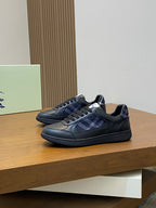 Burberry sneakers with blue plaid side panel, dark leather upper, lace-up