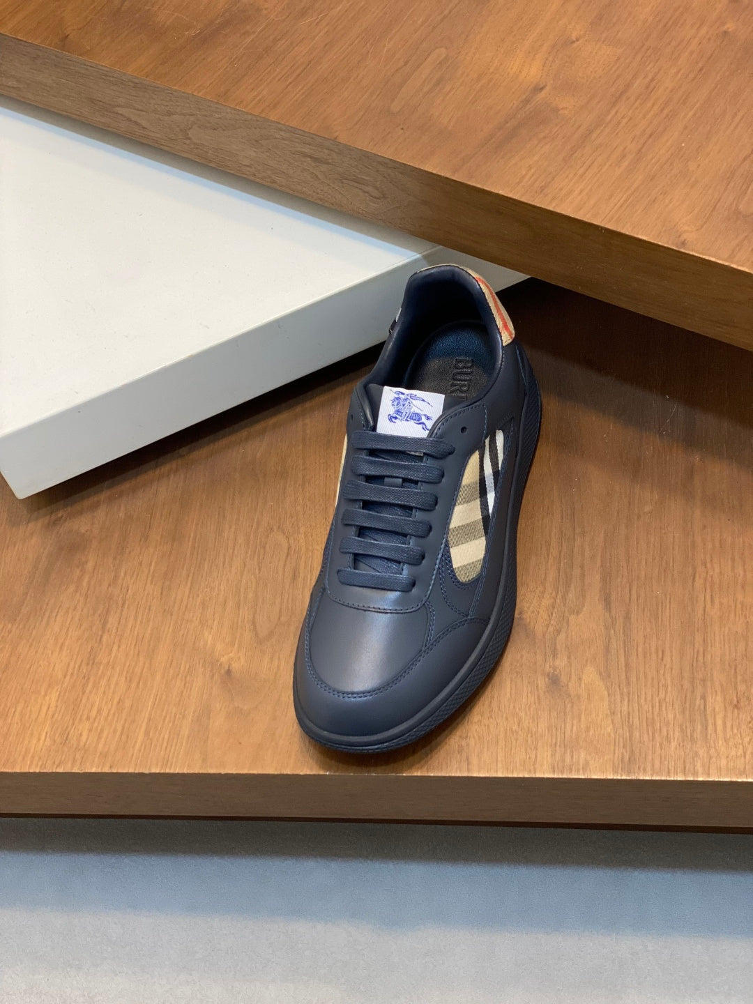 Burberry low-top sneaker, blue leather with lace-up front and check side panel