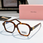 MiuMiu eyeglasses with warm brown square frames and clear lenses