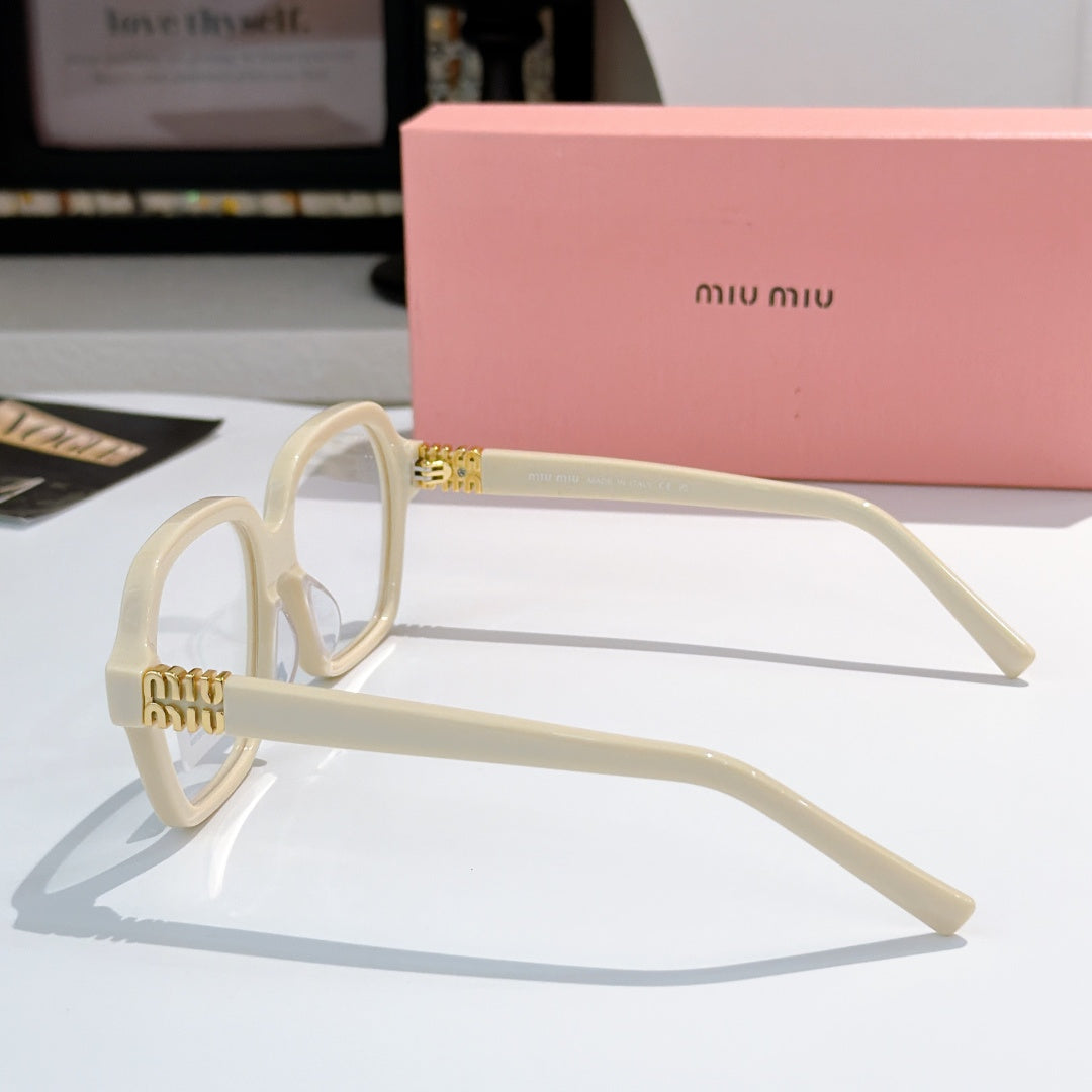 MiuMiu eyeglasses in cream with gold-tone ridged temple details
