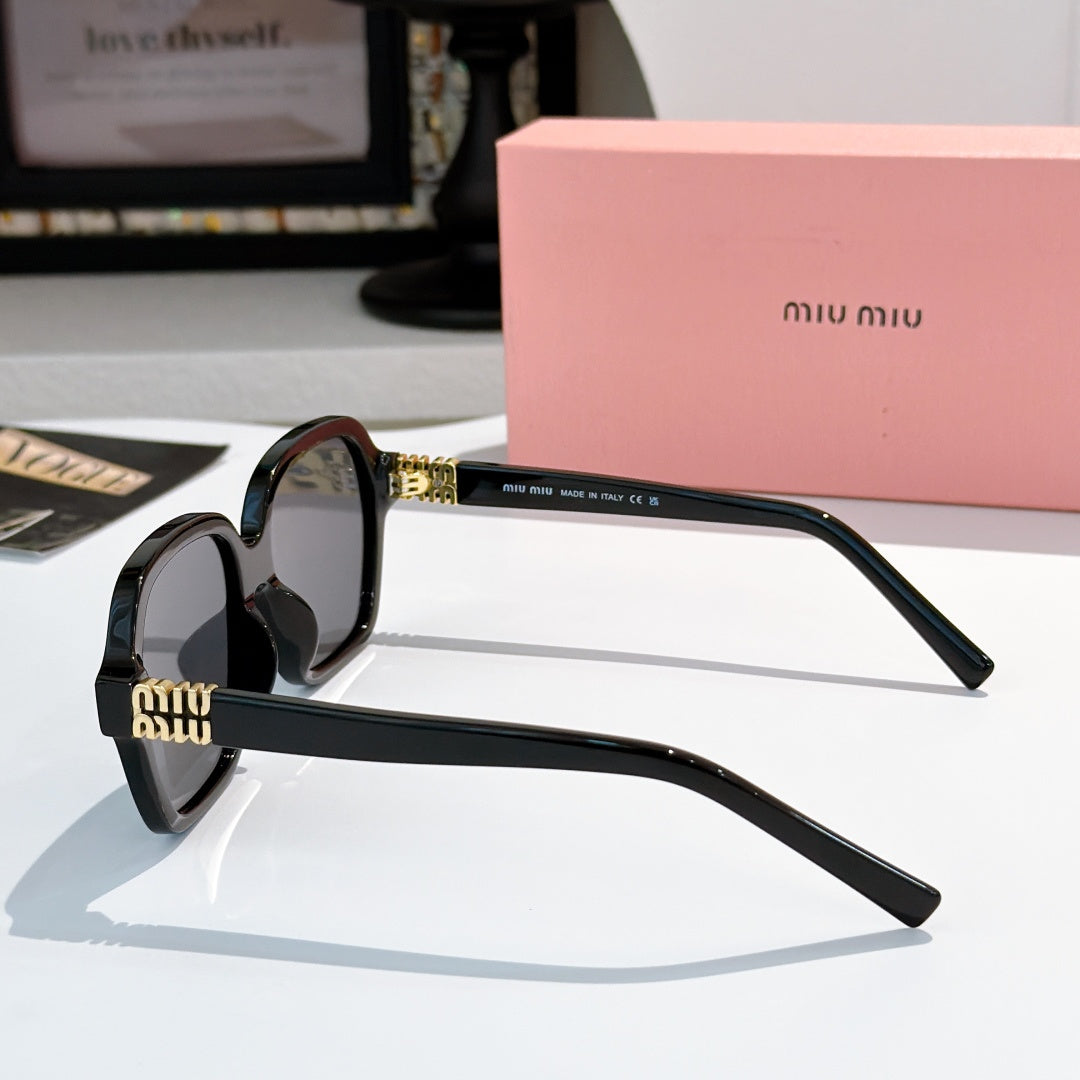 Square black acetate sunglasses, side view, with gold logo on temple