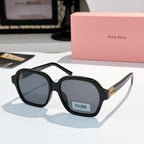 Square black acetate sunglasses with dark gray lenses and gold logo temple details