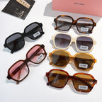 Assorted square sunglasses in black, cream, amber, maroon, and tortoiseshell frames