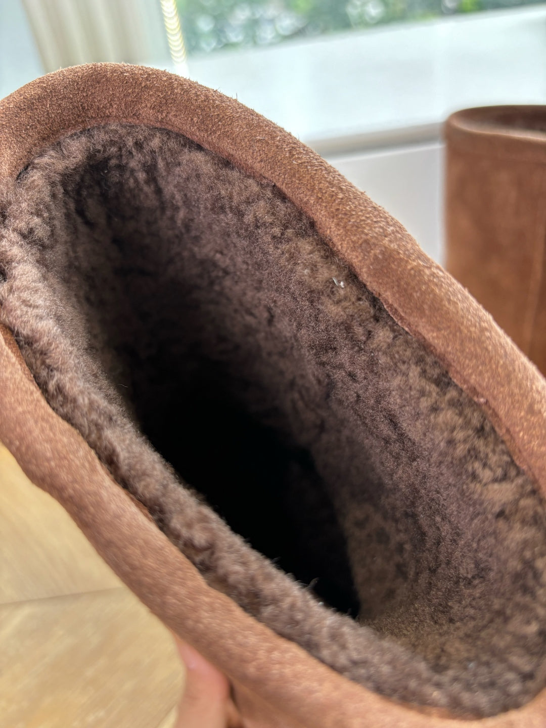 Balenciaga suede boot interior with dark fur lining, open top