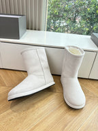 Balenciaga ladies suede ankle boots, light beige, pair with wide open shaft opening