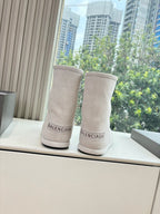 Balenciaga ladies suede ankle boots, light beige, back view with BALENCIAGA logo