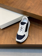 White and navy unisex lace-up sneakers with padded collar and side stripe panels
