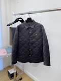Versace quilted jacket with dark button front and raised diamond stitching