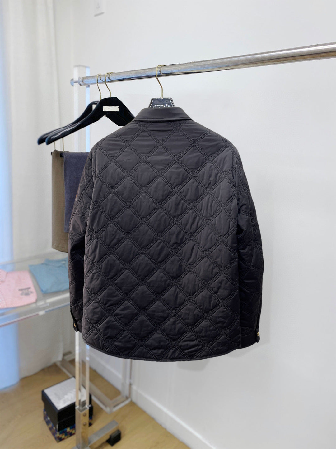 Versace quilted jacket back view with diamond pattern stitching