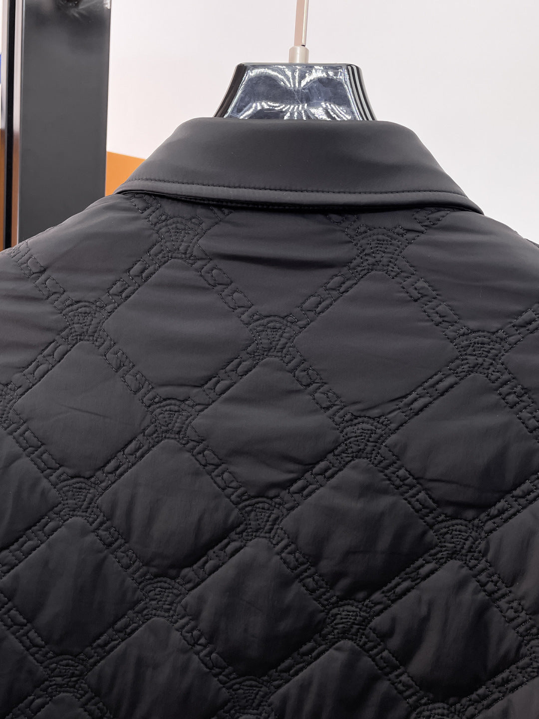 Versace quilted jacket collar and upper back with dark diamond stitching