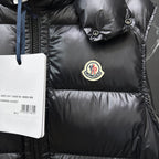 Moncler long puffer vest, black, round logo patch on chest with white tag