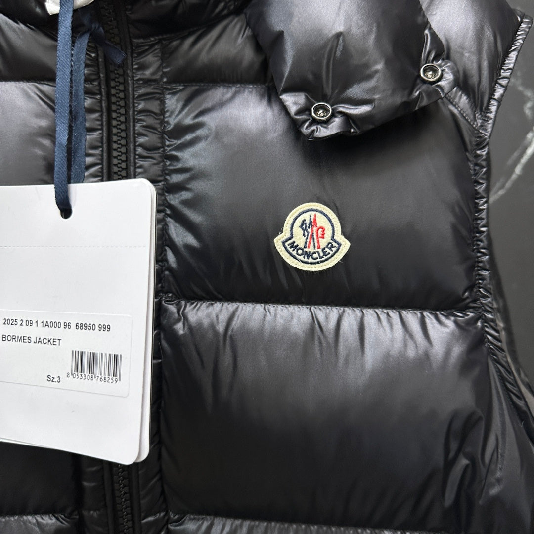 Moncler long puffer vest, black, round logo patch on chest with white tag