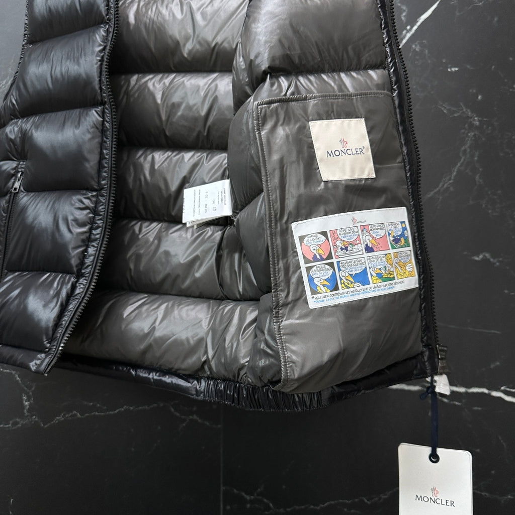 Moncler long puffer vest, black lining, inner pocket with white product tags
