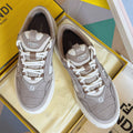 Taupe and white Fendi low-top sneakers with white laces and chunky sole