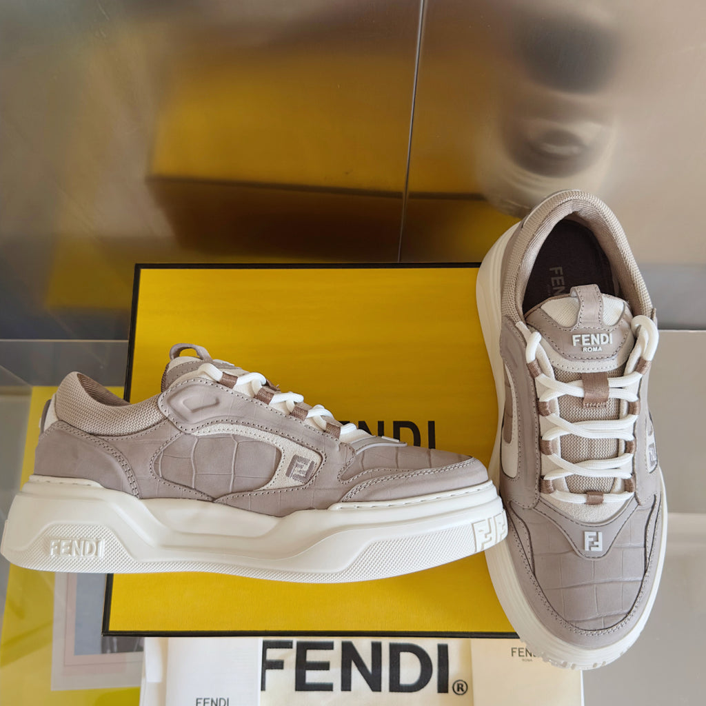 Taupe Fendi low-top sneakers, side view with white laces and thick sole
