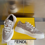 Taupe Fendi low-top sneakers pair, one side and one angled view, white laces