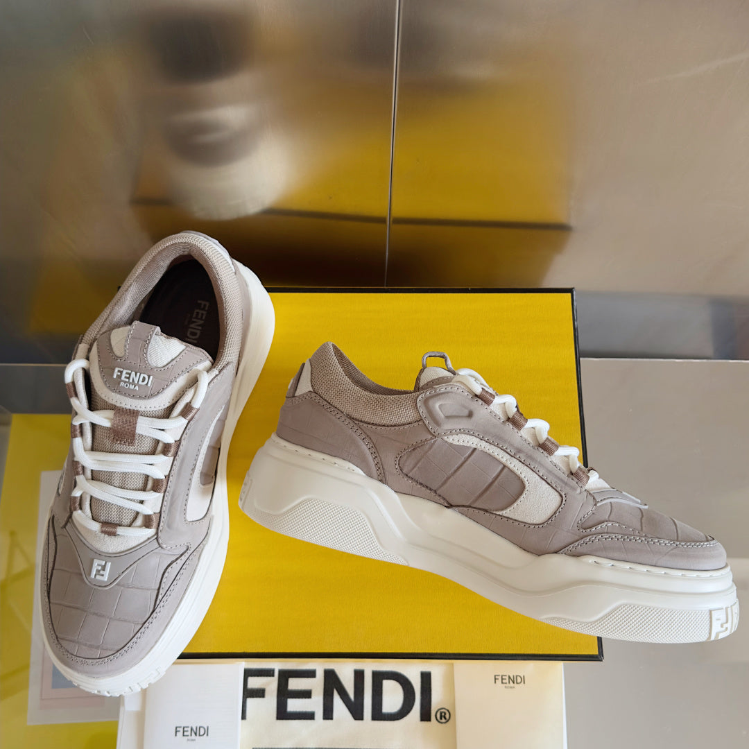 Taupe Fendi low-top sneakers pair, one side and one angled view, white laces