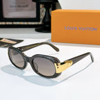 Louis Vuitton sunglasses with black frames and gold-tone logo temple detail
