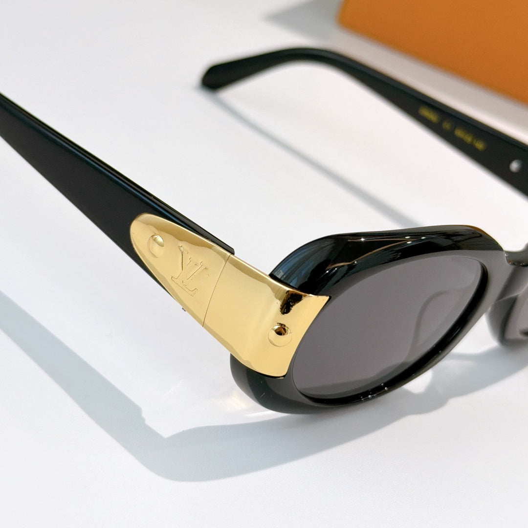 Louis Vuitton sunglasses side view, black arms with gold logo plate