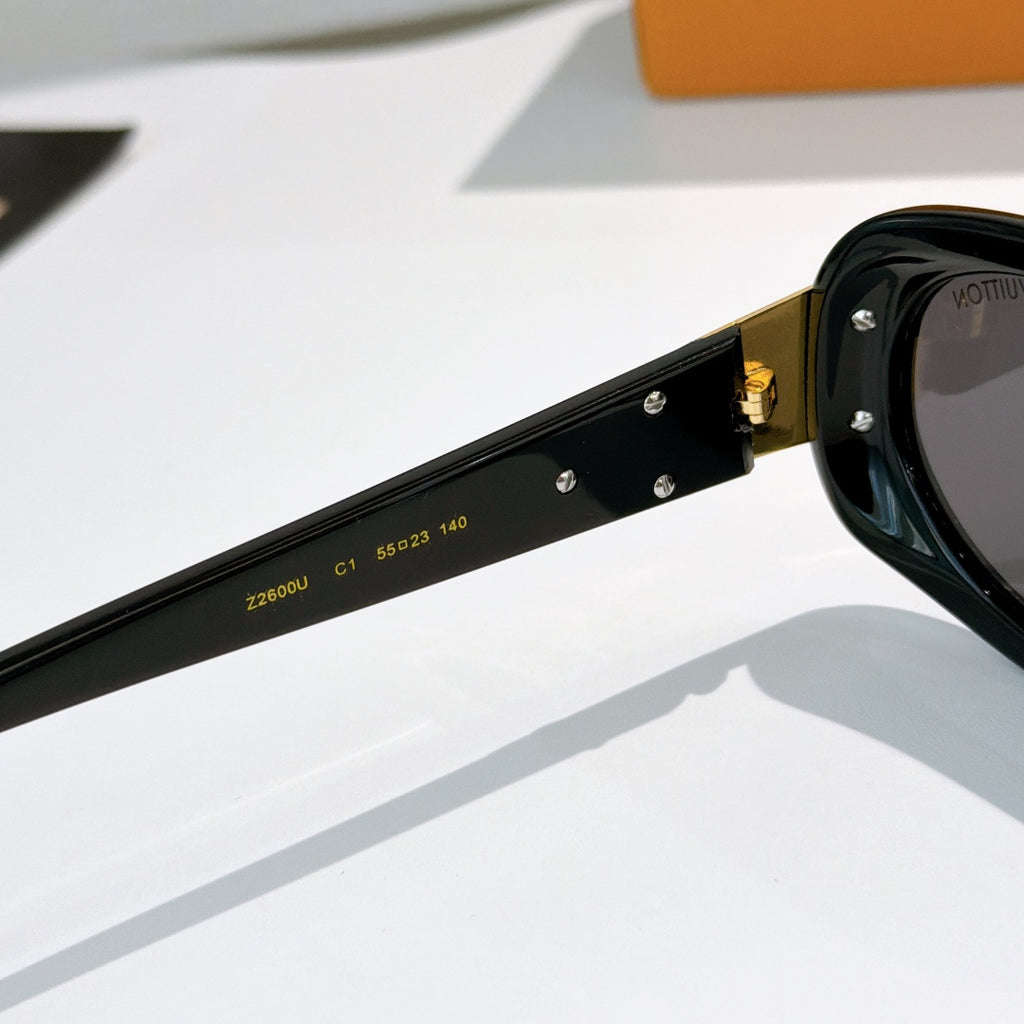 Louis Vuitton sunglasses temple close-up with printed numbers on black frame