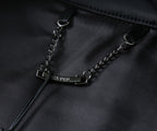 Black jacket fabric with silver-tone chain and rectangular logo tag